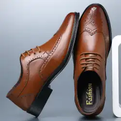 新しい春の靴の男性の卸売大型ビジネスフォーマルブローグシューズ英国のレースの通気性のあるカジュアルな男性の靴