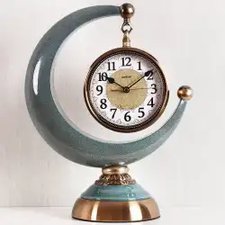 三日月形時計装飾リビングルームヨーロピアンスタイルのミニマリストモダンデスククロックライトラグジュアリーファッションパーソナリティクリエイティブデスクトップクロックミュート