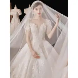 メインのウェディングドレス202122新しい花嫁の気質の宮殿のスタイルのハイエンドの末尾の小さなウェディングドレスは糸を出ます