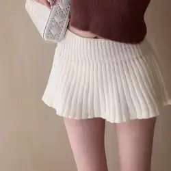 エヴァ・ジュンジュン・ソースは、脚の長さの熱い女の子の純粋な欲望のニット・ミニ・プリーツ・スカート・エラスティック・オールマッチのセクシーなミニスカートを示しています