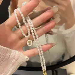優しい気質のバラの真珠のネックレスの女性のフレンチ ライト高級ニッチなデザインのハイエンド鎖骨チェーン アクセサリー